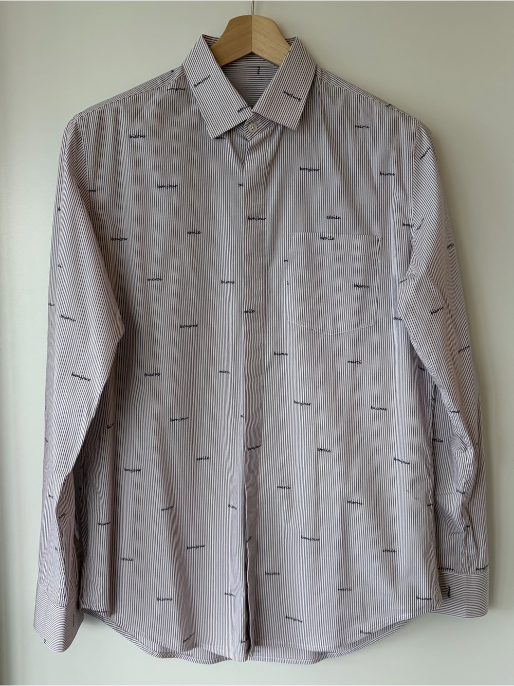 Men's Light Blue Striped Button-Up Shirt with Subtle Navy Print
